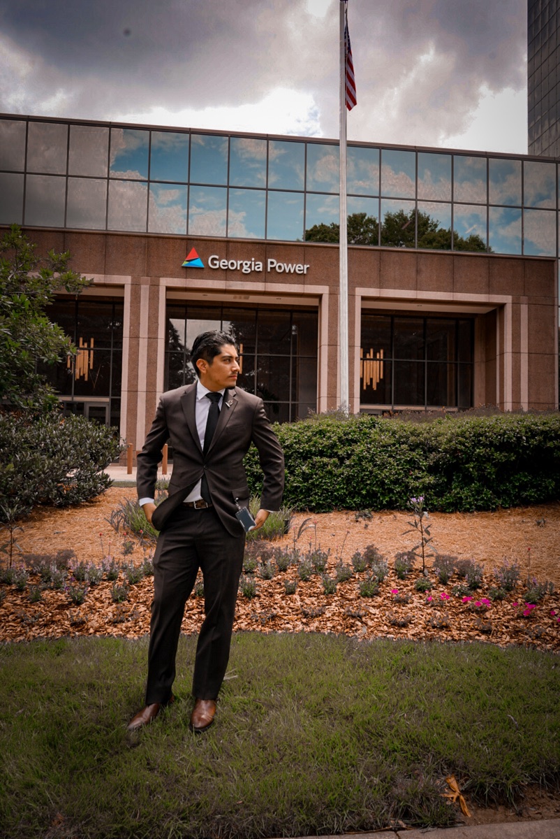 Outside Georgia Power headquarters in a suit