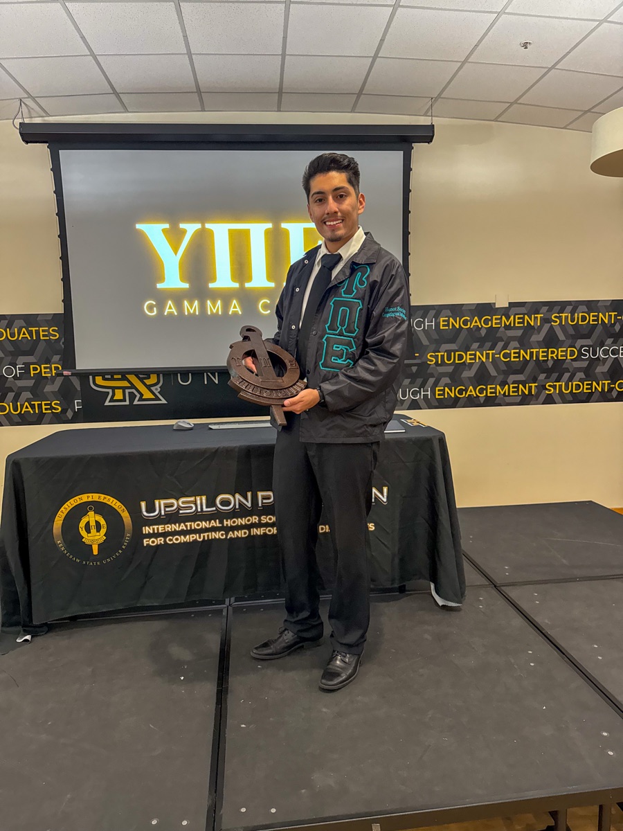 Upsilon Pi Epsilon honor society trophy